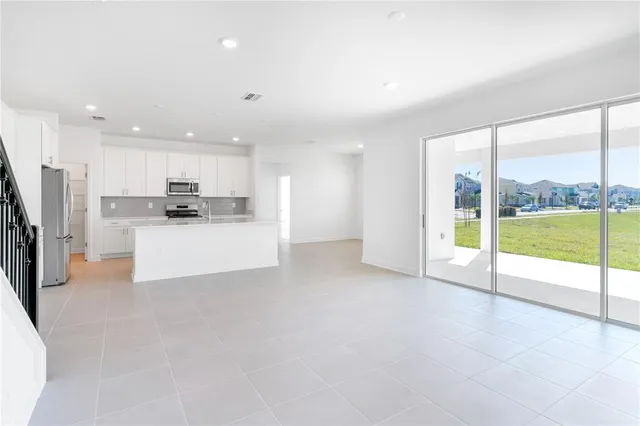 a bathroom with a double vanity sink and mirror