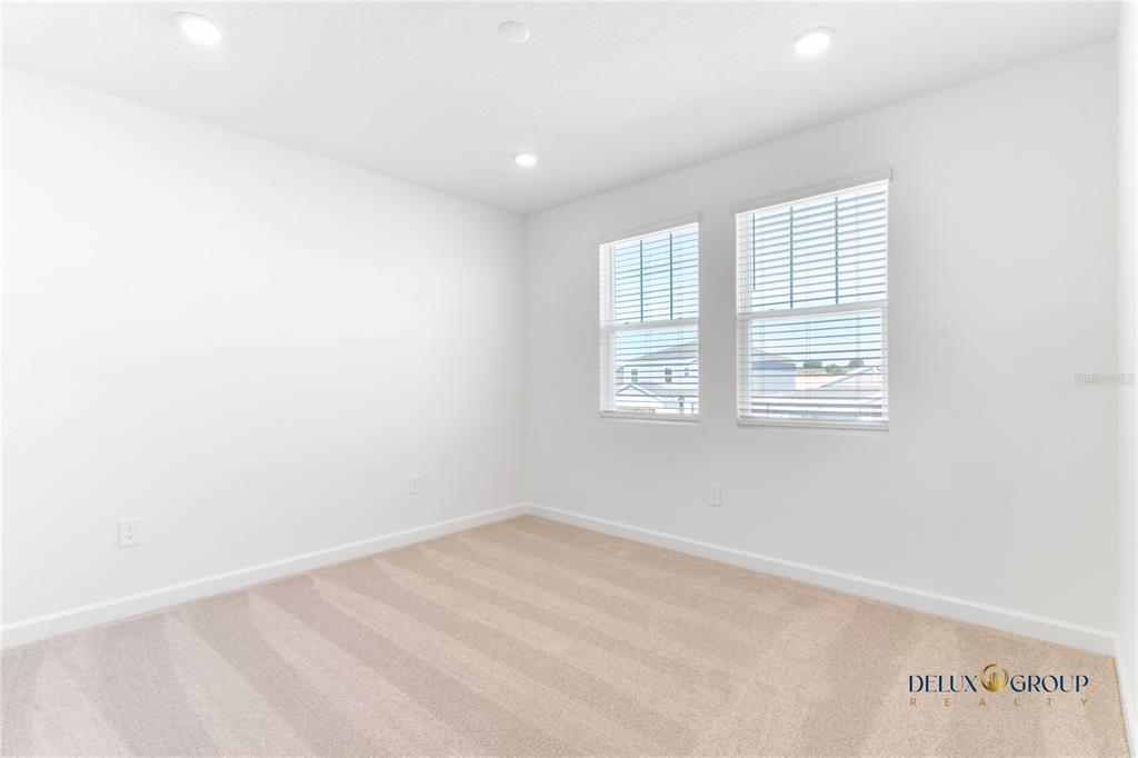 2947 Believe In Yourself Court Clermont, FL 34714 - Photo 34 of 50 an empty room with windows