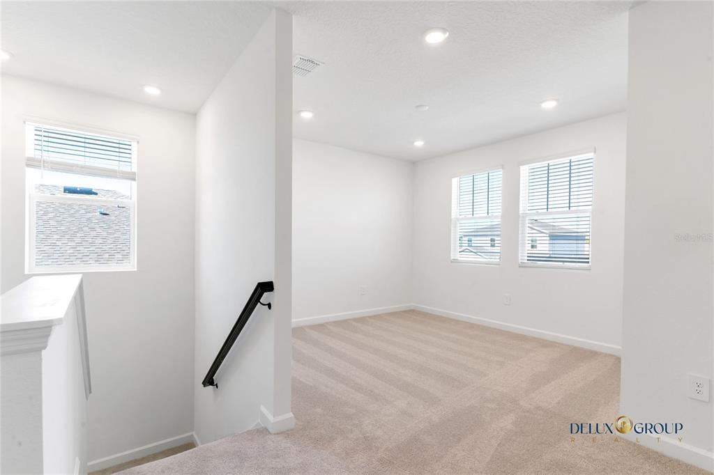 2947 Believe In Yourself Court Clermont, FL 34714 - Photo 35 of 50 a view of a hallway with windows