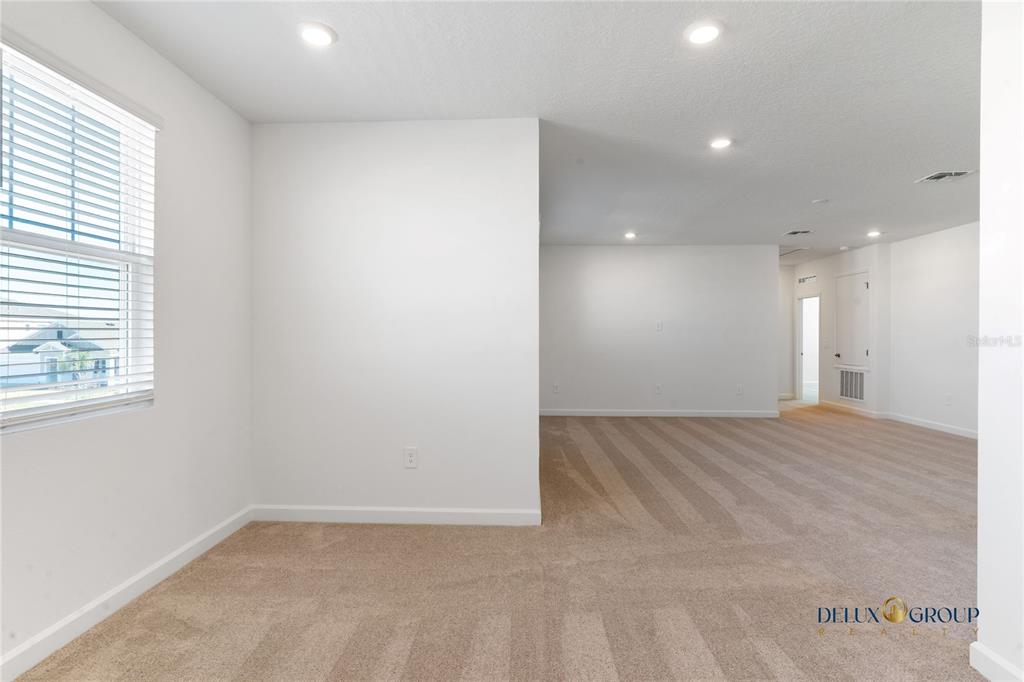 2947 Believe In Yourself Court Clermont, FL 34714 - Photo 36 of 50 a view of an empty room with a window