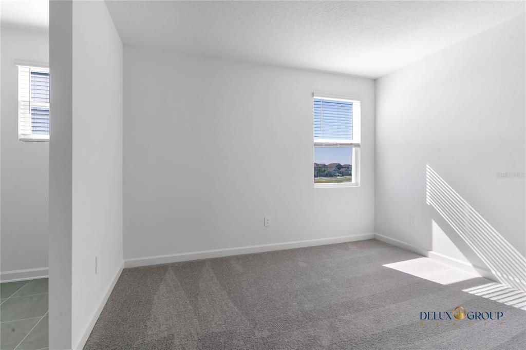 2947 Believe In Yourself Court Clermont, FL 34714 - Photo 38 of 50 an empty room with windows