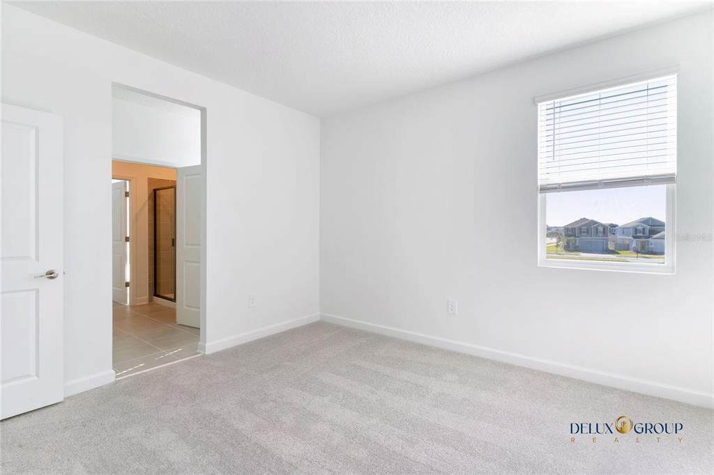 2947 Believe In Yourself Court Clermont, FL 34714 - Photo 39 of 50 an empty room with a window