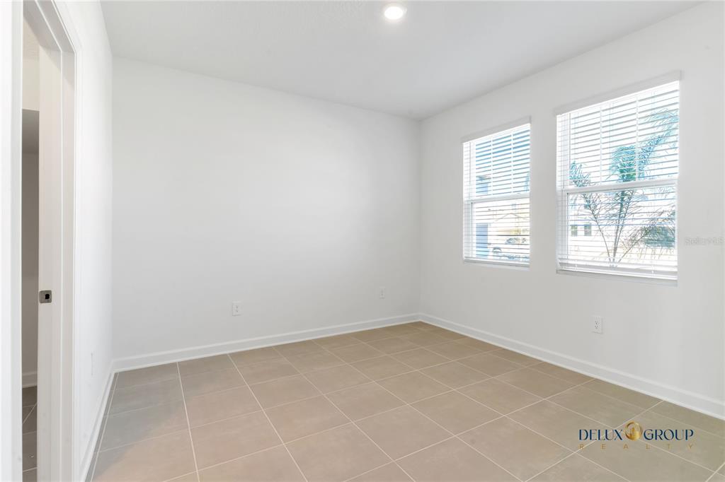 2947 Believe In Yourself Court Clermont, FL 34714 - Photo 4 of 50 an empty room with a window