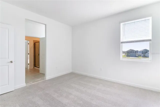 a bathroom with a toilet and a sink