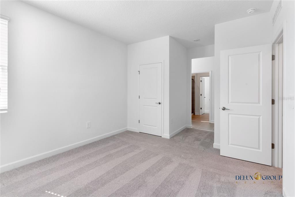 2947 Believe In Yourself Court Clermont, FL 34714 - Photo 43 of 50 an empty room with a bathroom