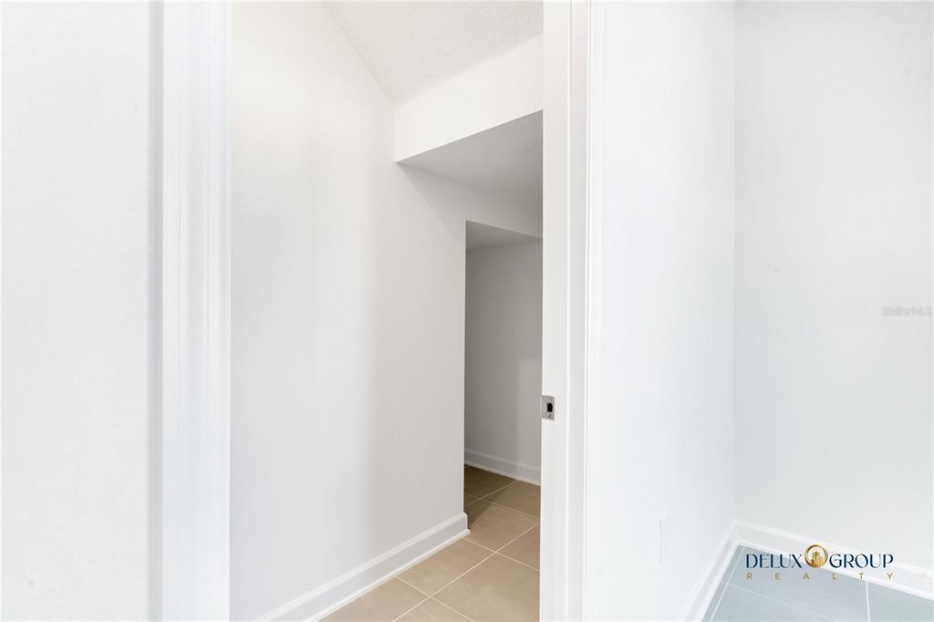 2947 Believe In Yourself Court Clermont, FL 34714 - Photo 6 of 50 a view of a hallway