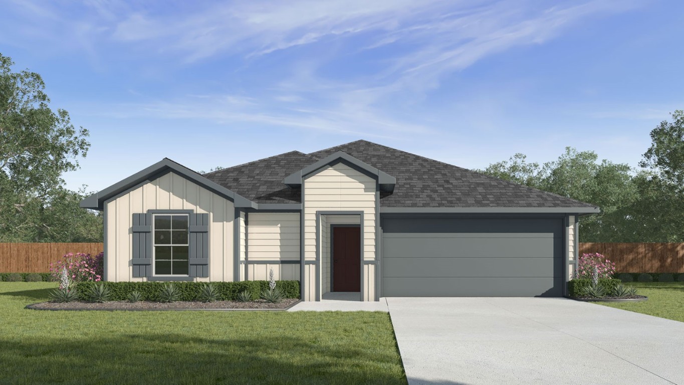 304 Wirecrested Drive Lockhart, TX 78644 - Photo 1 of 1 a front view of a house with a yard and garage