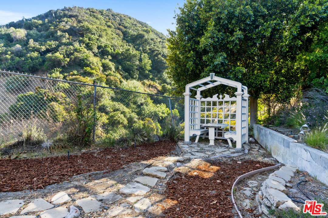 3371 Mandeville Canyon Road Los Angeles, CA 90049 - Photo 39 of 44 a view of outdoor space yard and patio