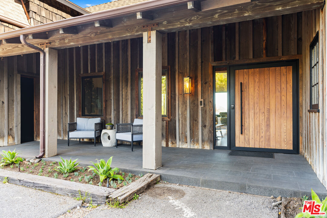 3371 Mandeville Canyon Road Los Angeles, CA 90049 - Photo 5 of 44 a view of outdoor space and patio