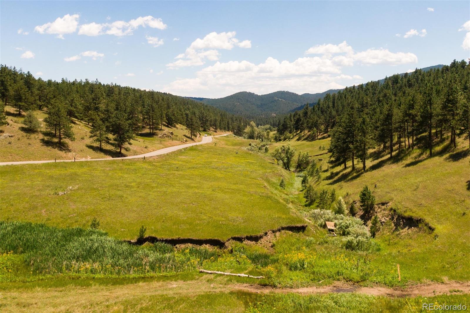 2414 Legacy Ranch Road Evergreen, CO 80439 - Photo 12 of 13 a view of an ocean
