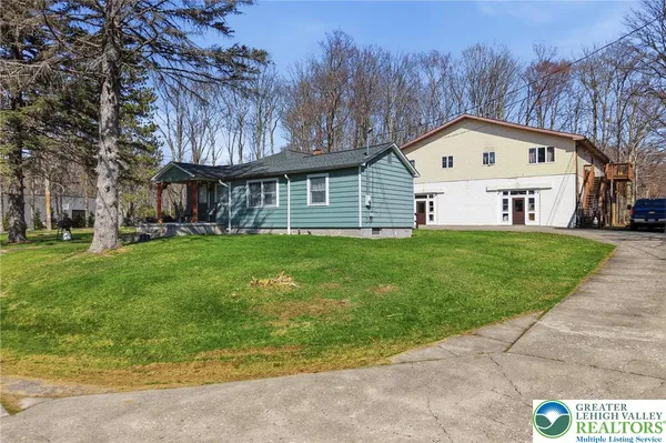 a front view of house with yard