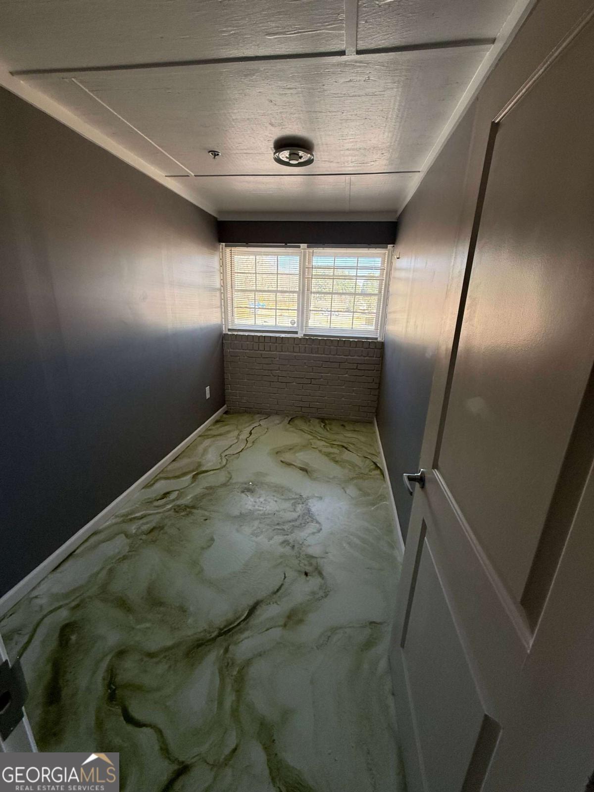 1001 Oak Road Southwest, Unit 1 Lilburn, GA 30047 - Photo 8 of 12 a view of empty room