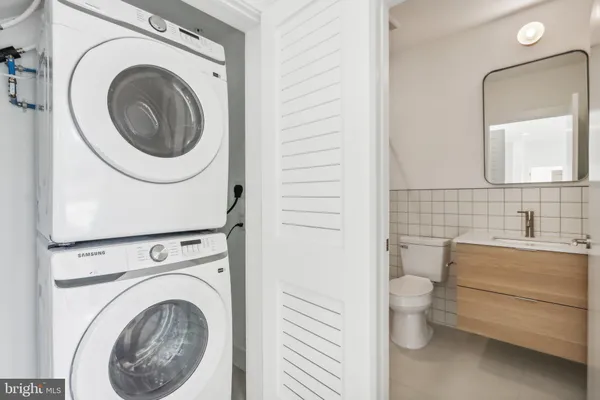 a utility room with dryer and washer