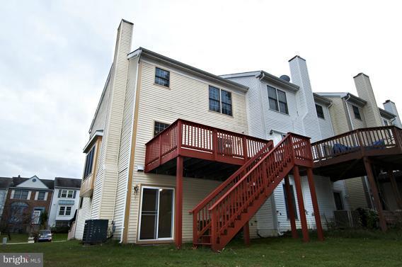 2247 Conquest Way, Unit 63 Odenton, MD 21113 - Photo 14 of 30 a view of front of house with a yard