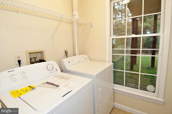 2247 Conquest Way, Unit 63 Odenton, MD 21113 - Photo 24 of 30 a utility room with dryer and washer