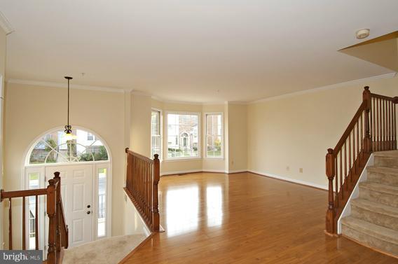 2247 Conquest Way, Unit 63 Odenton, MD 21113 - Photo 4 of 30 a view of a living room hardwood and furniture