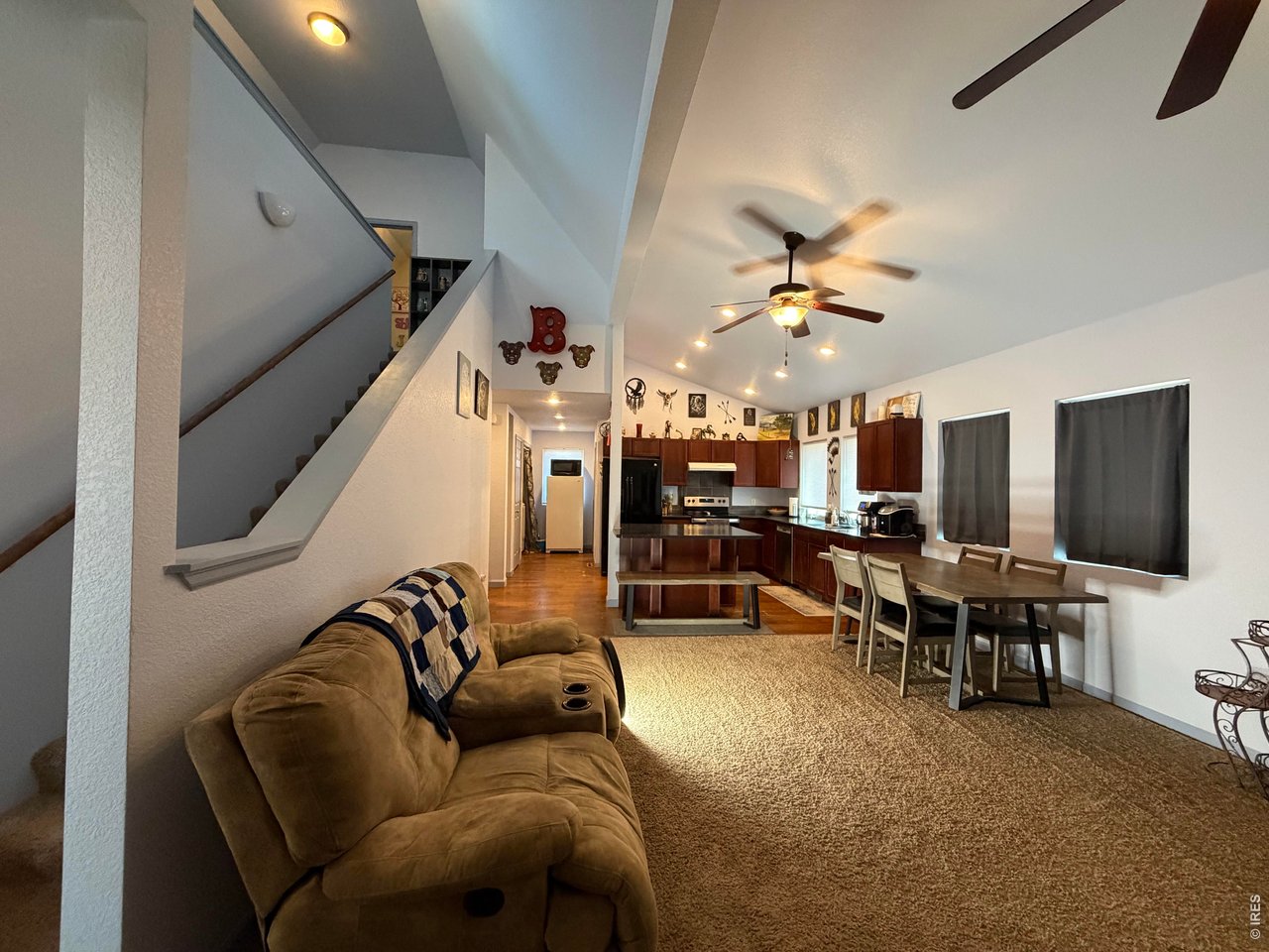 401 Church Street Kit Carson, CO 80825 - Photo 14 of 31 a living room with furniture and a flat screen tv