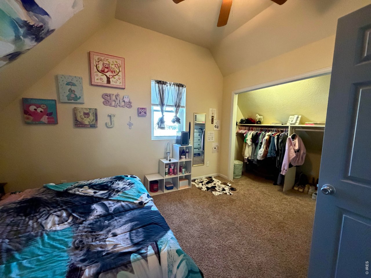 401 Church Street Kit Carson, CO 80825 - Photo 20 of 31 a bed sitting in a room next to a window
