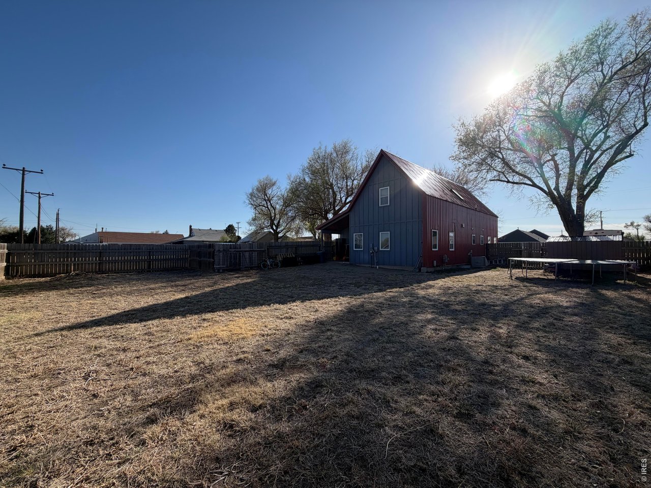 401 Church Street Kit Carson, CO 80825 - Photo 25 of 31 a view of house with yard and car parked