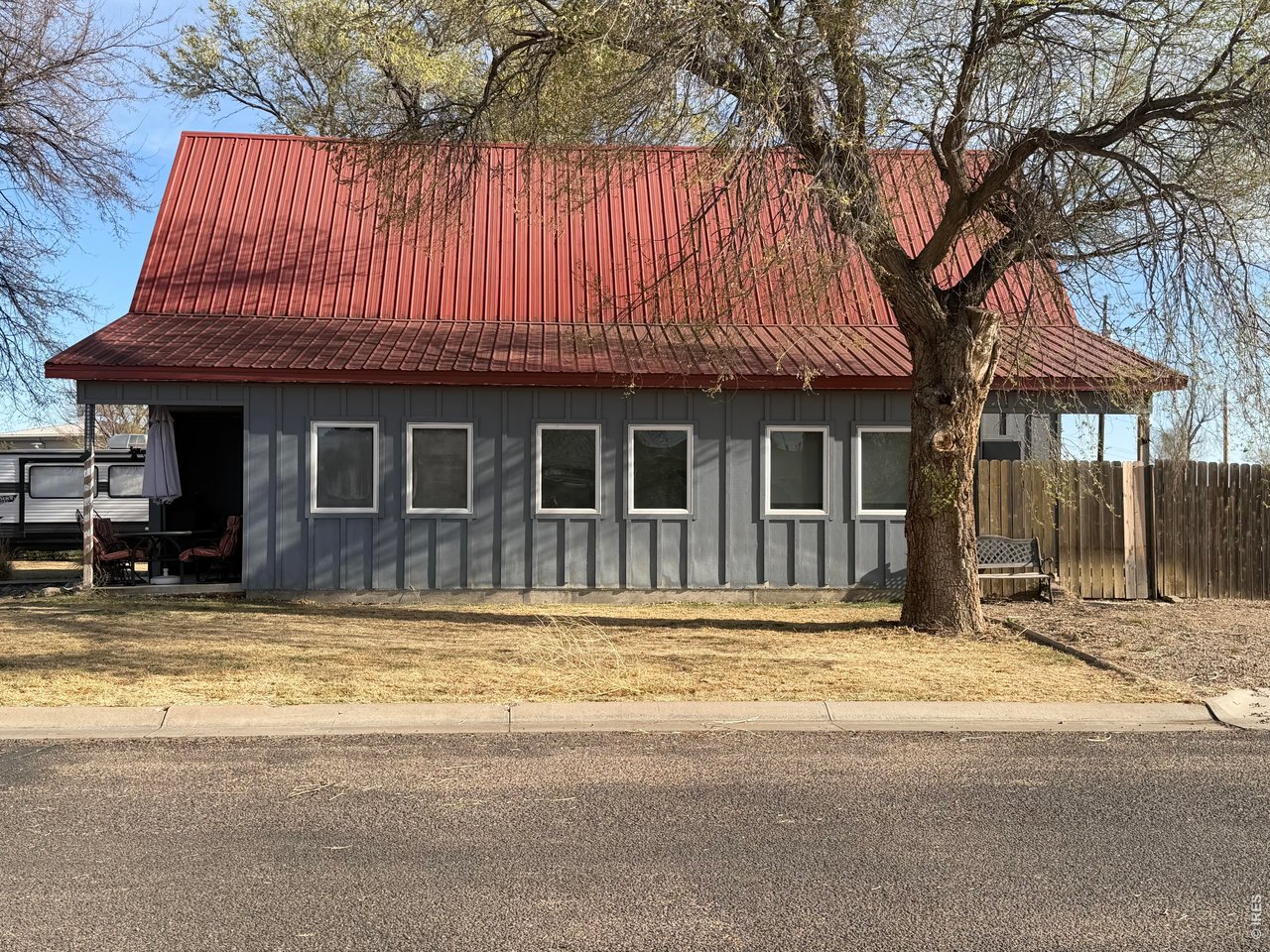 401 Church Street Kit Carson, CO 80825 - Photo 4 of 31 a view of a house with a swimming pool