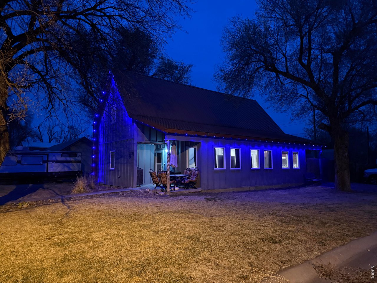 401 Church Street Kit Carson, CO 80825 - Photo 5 of 31 a view of a yard with a fire pit