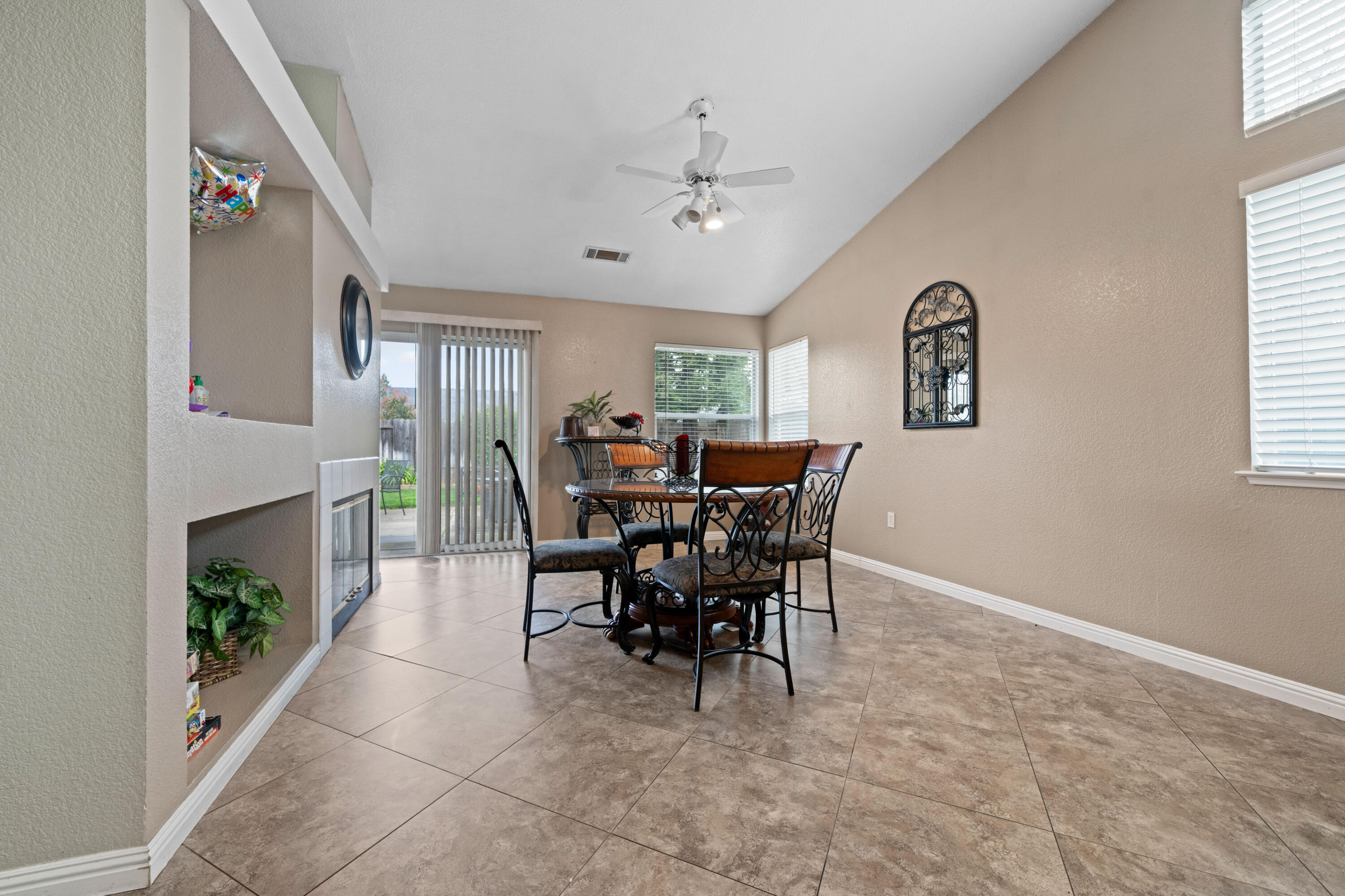 1959 Alexis Court Redding, CA 96002 - Photo 12 of 34 a view of a dining room with furniture and a window