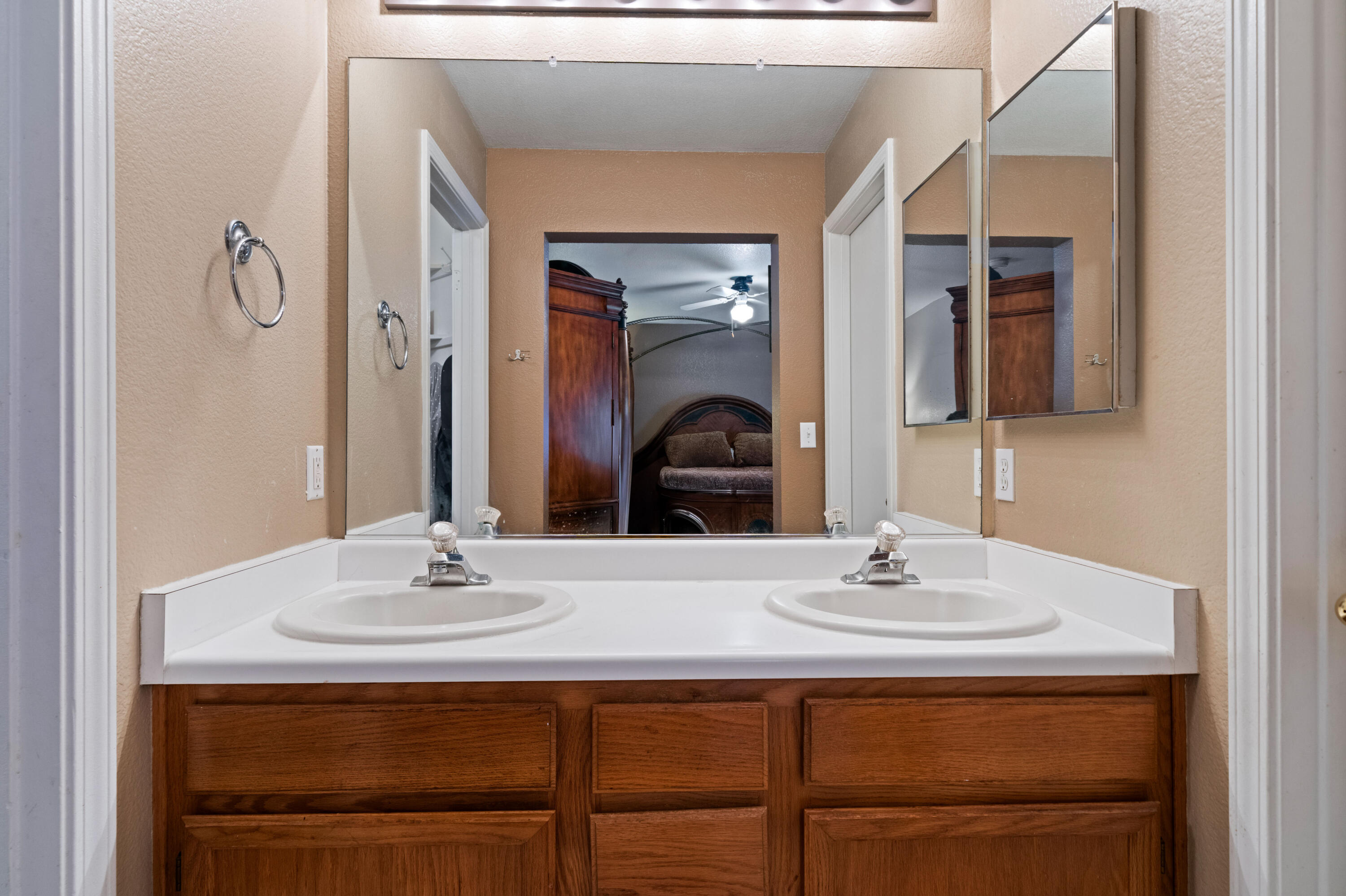 1959 Alexis Court Redding, CA 96002 - Photo 16 of 34 a bathroom with a sink and a mirror