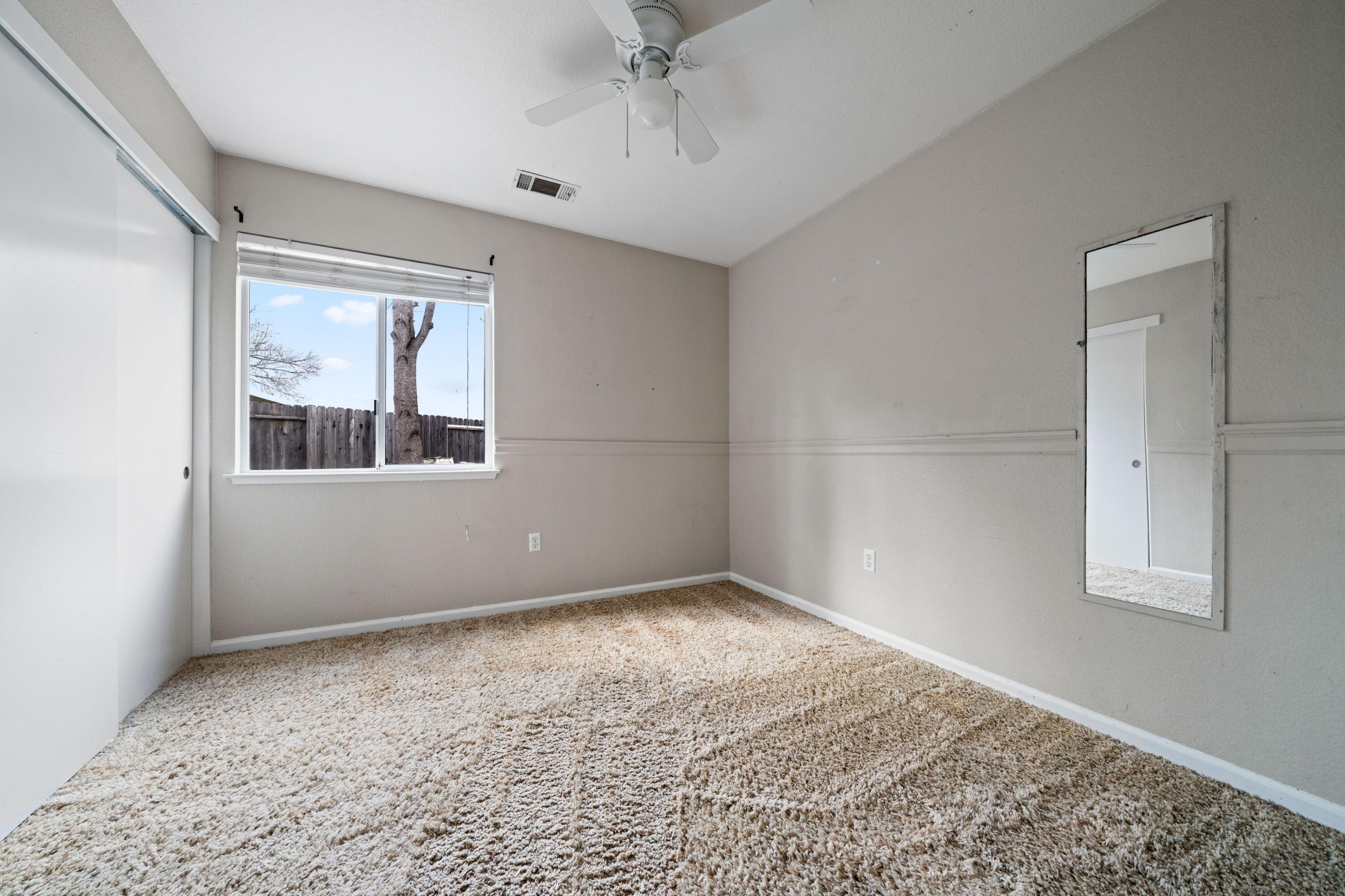 1959 Alexis Court Redding, CA 96002 - Photo 18 of 34 a view of an empty room with a window