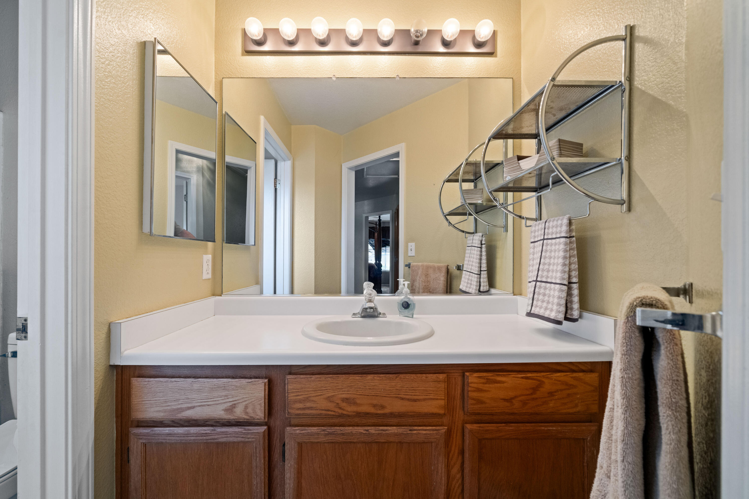 1959 Alexis Court Redding, CA 96002 - Photo 20 of 34 a bathroom with a sink and a mirror