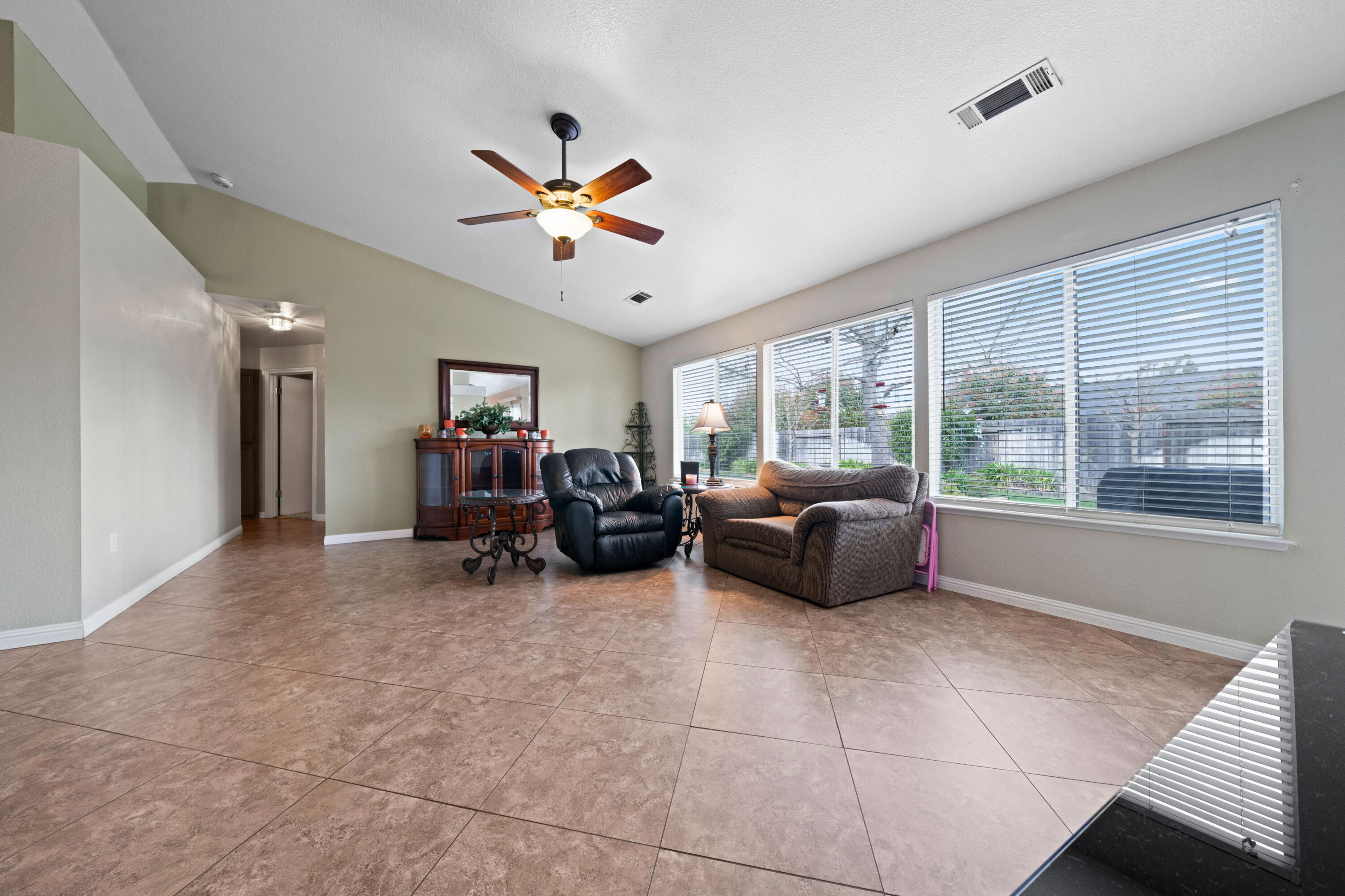 1959 Alexis Court Redding, CA 96002 - Photo 8 of 34 a living room with furniture and a large window