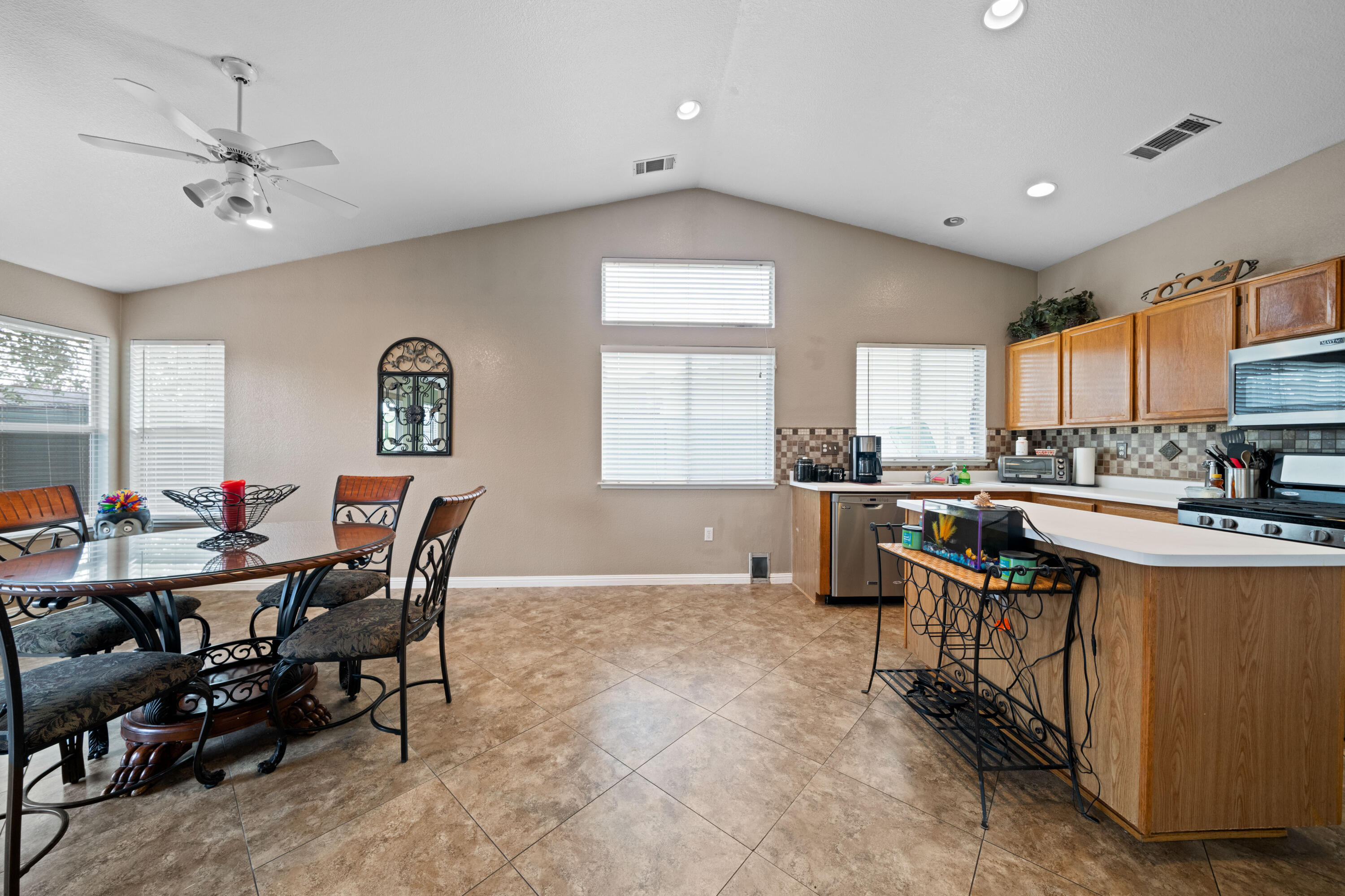 1959 Alexis Court Redding, CA 96002 - Photo 9 of 34 a view of a dining room with furniture and a kitchen