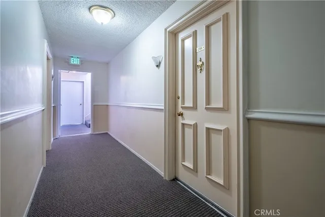 a front view of a house with a yard and outdoor seating