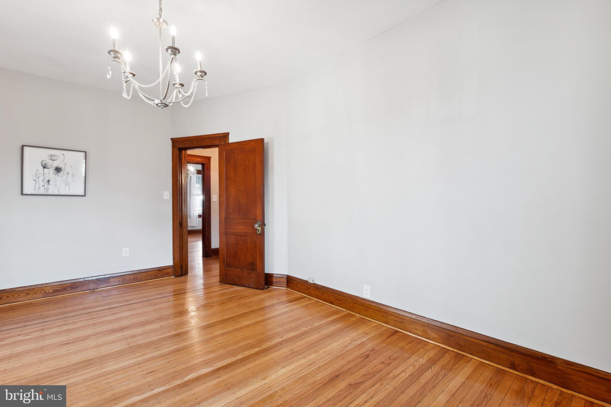 222 Mallow Hill Road Baltimore, MD 21229 - Photo 27 of 47 Bedroom Three w/ Hardwood Floors
