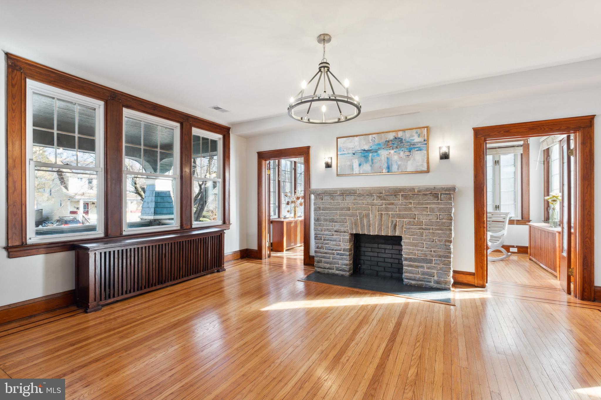 222 Mallow Hill Road Baltimore, MD 21229 - Photo 3 of 47 Living Room w/ Fireplace & Original Hardwood