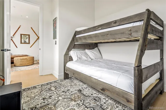 a bedroom with a bed and walk in closet