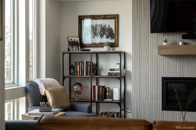 a view of living room with furniture and window