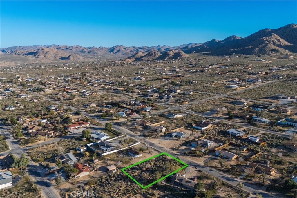 60432 Latham Trail Joshua Tree, CA 92252 - Photo 16 of 25 an aerial view of residential house and sandy dunes