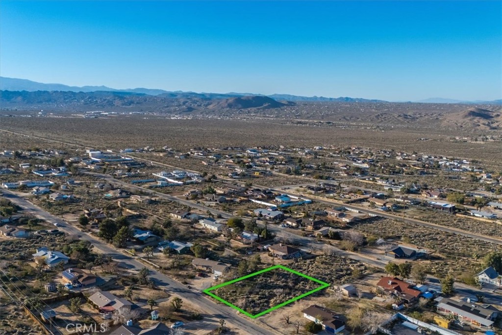 60432 Latham Trail Joshua Tree, CA 92252 - Photo 5 of 25 an aerial view of residential house and green space