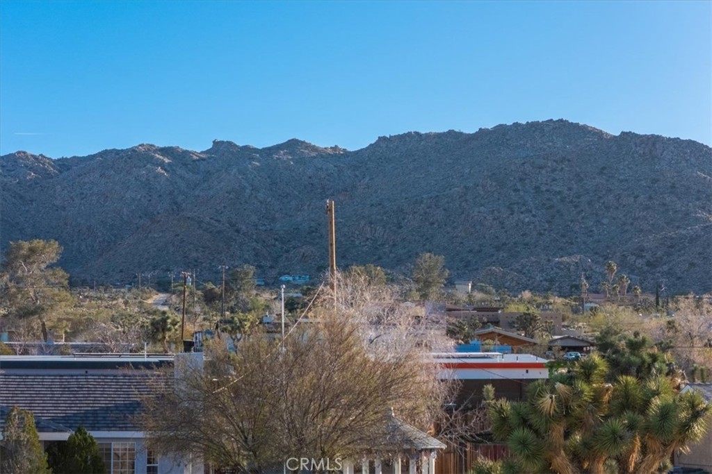60432 Latham Trail Joshua Tree, CA 92252 - Photo 7 of 25 a view of a city with a mountain