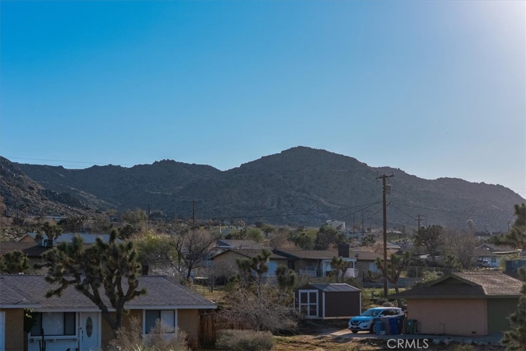 60432 Latham Trail Joshua Tree, CA 92252 - Photo 8 of 25 a view of a city with a mountain