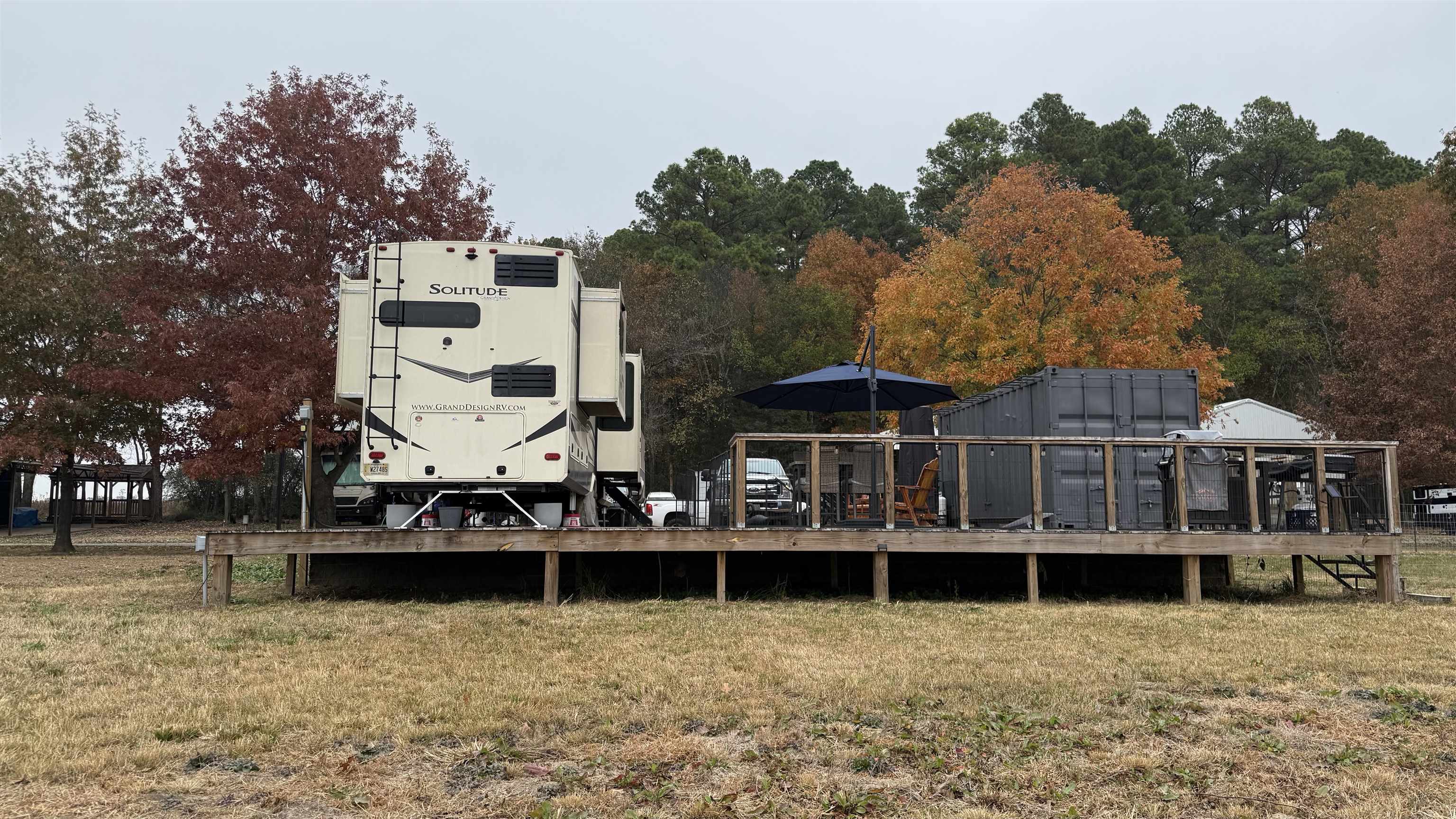 771 Botel Road Savannah, TN 38372 - Photo 2 of 9 a front view of a house with large trees