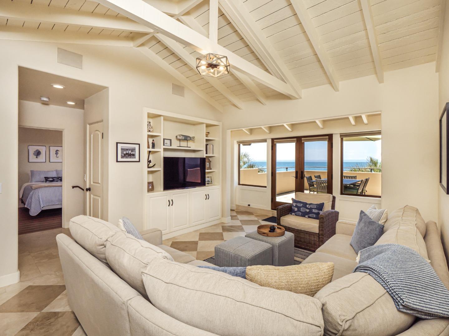 431 Beach Drive Aptos, CA 95003 - Photo 15 of 47 a living room with furniture and a flat screen tv