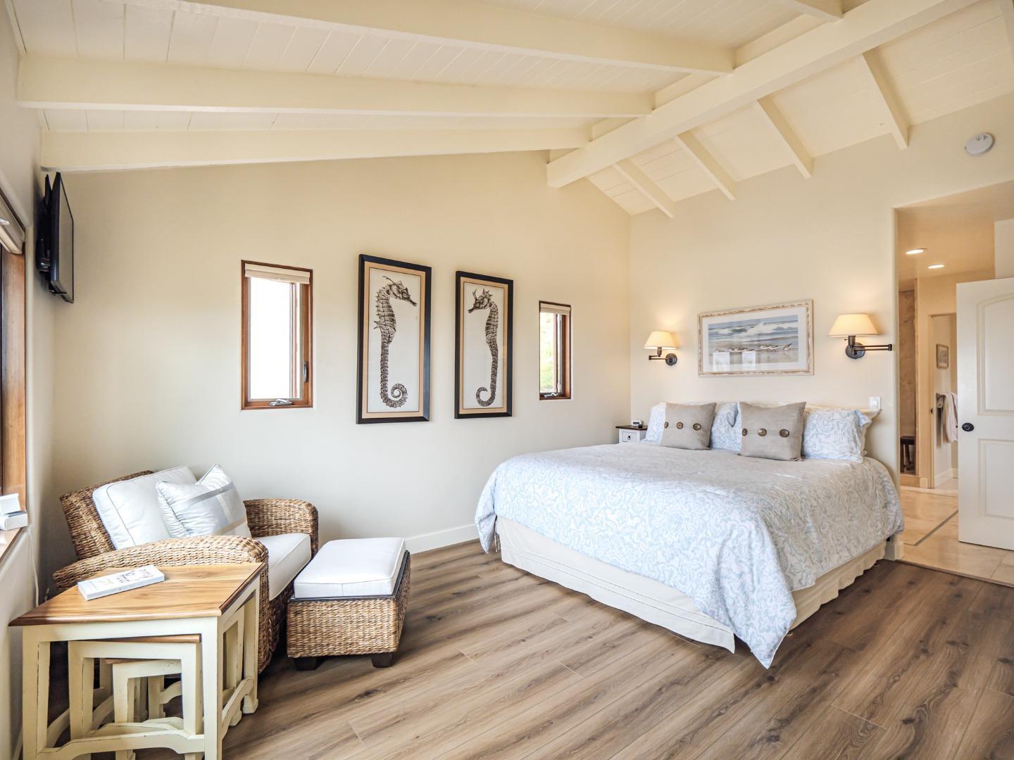 431 Beach Drive Aptos, CA 95003 - Photo 21 of 47 a bedroom with a bed and a couch