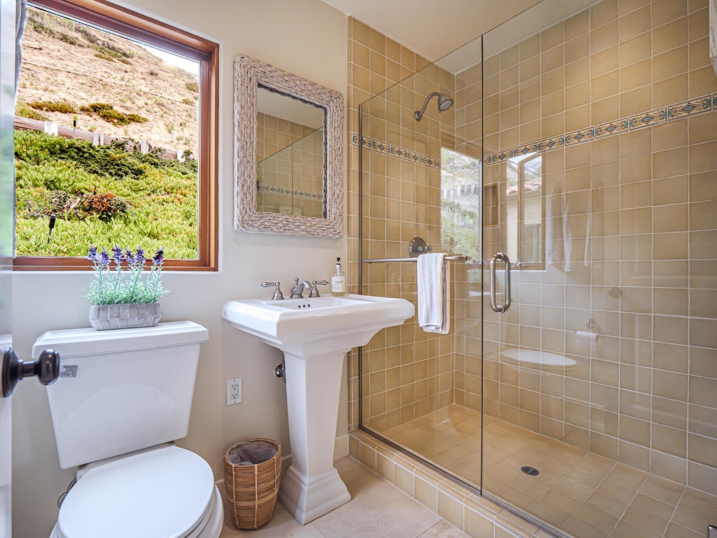 431 Beach Drive Aptos, CA 95003 - Photo 25 of 47 a bathroom with a sink toilet and shower