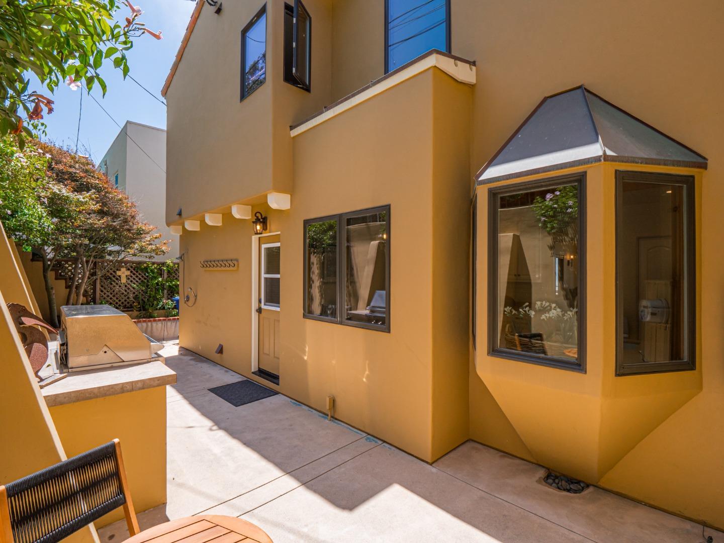 431 Beach Drive Aptos, CA 95003 - Photo 31 of 47 a view of a house with a outdoor space