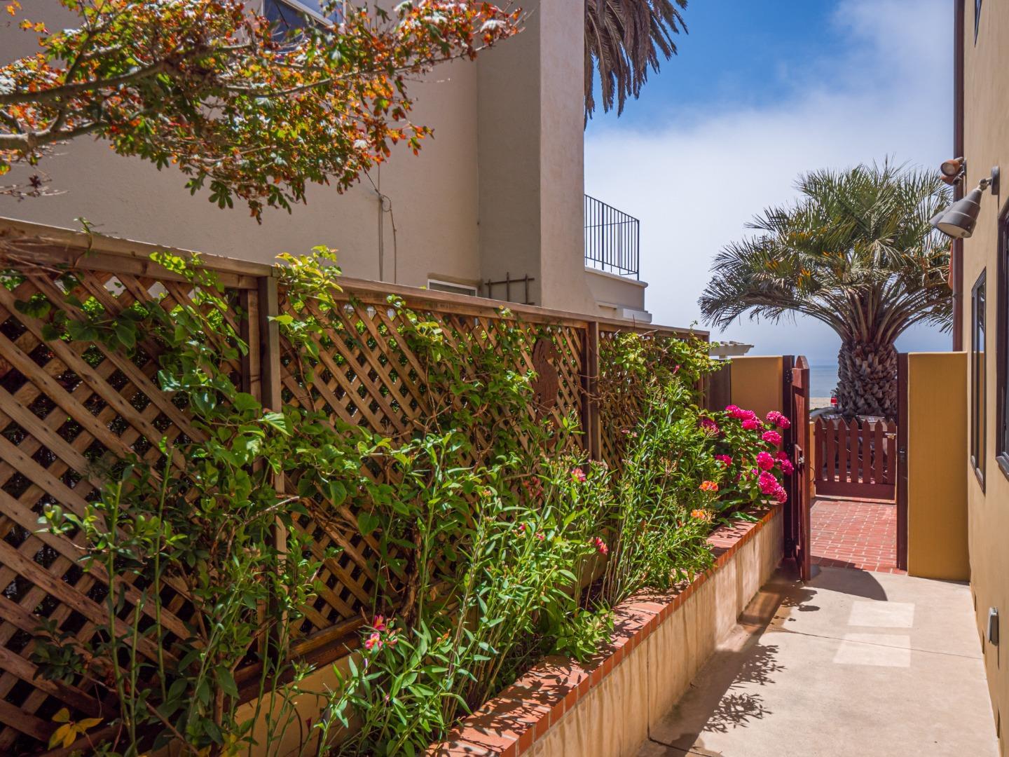 431 Beach Drive Aptos, CA 95003 - Photo 36 of 47 a street view with tall buildings