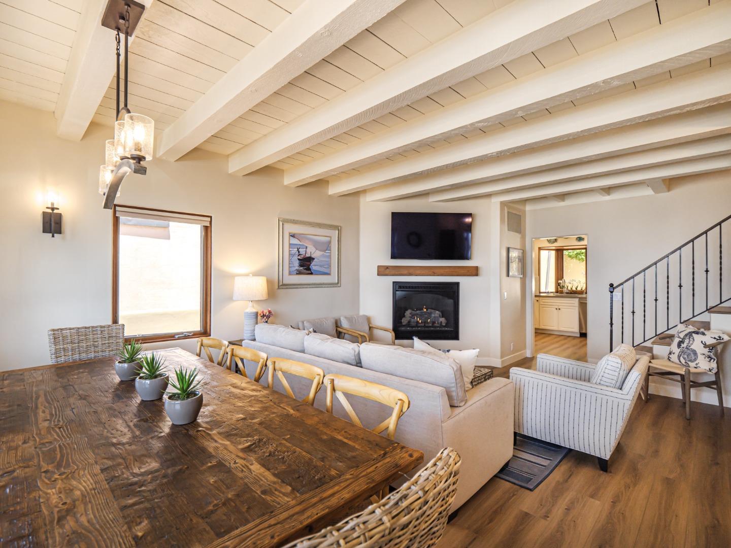 431 Beach Drive Aptos, CA 95003 - Photo 5 of 47 a living room with fireplace furniture and a wooden floor