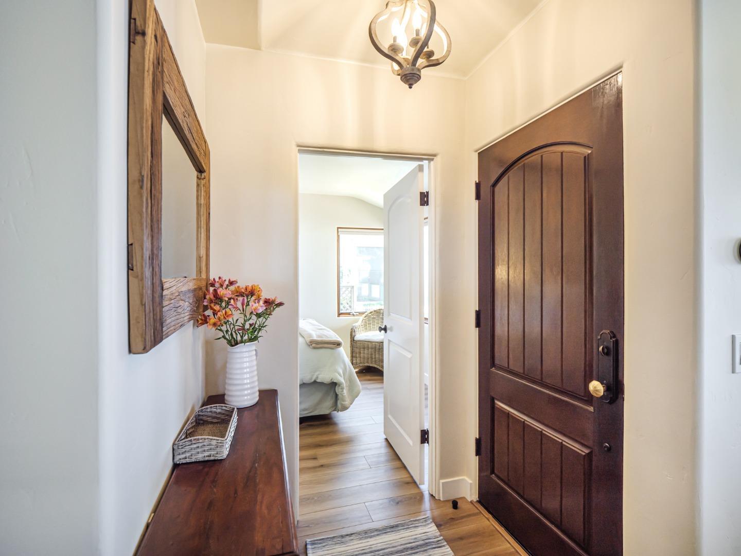 431 Beach Drive Aptos, CA 95003 - Photo 9 of 47 a view of a hallway and a livingroom with furniture