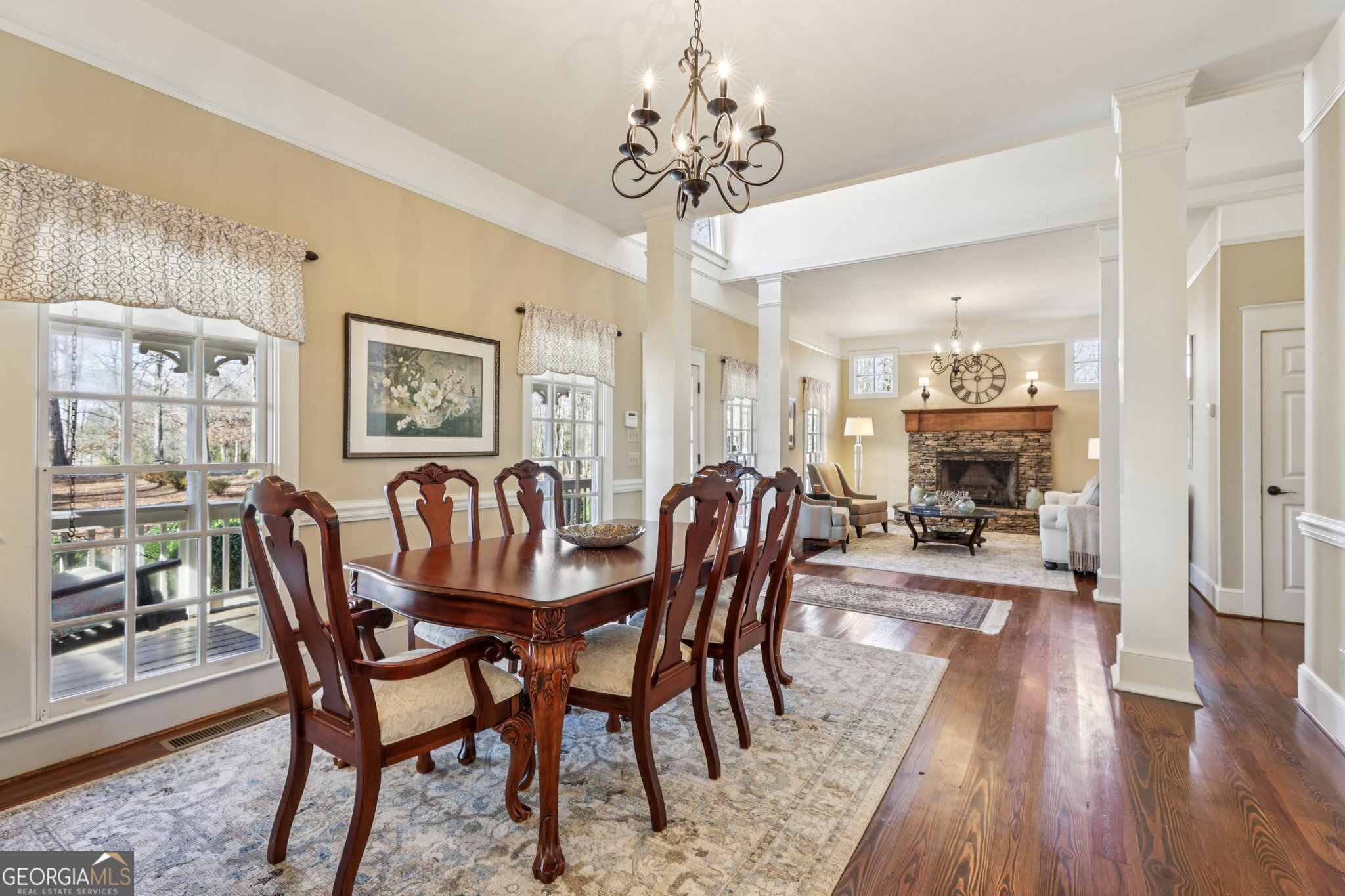 1015 Adams Road West Point, GA 31833 - Photo 15 of 108 a dining room with furniture a chandelier and wooden floor