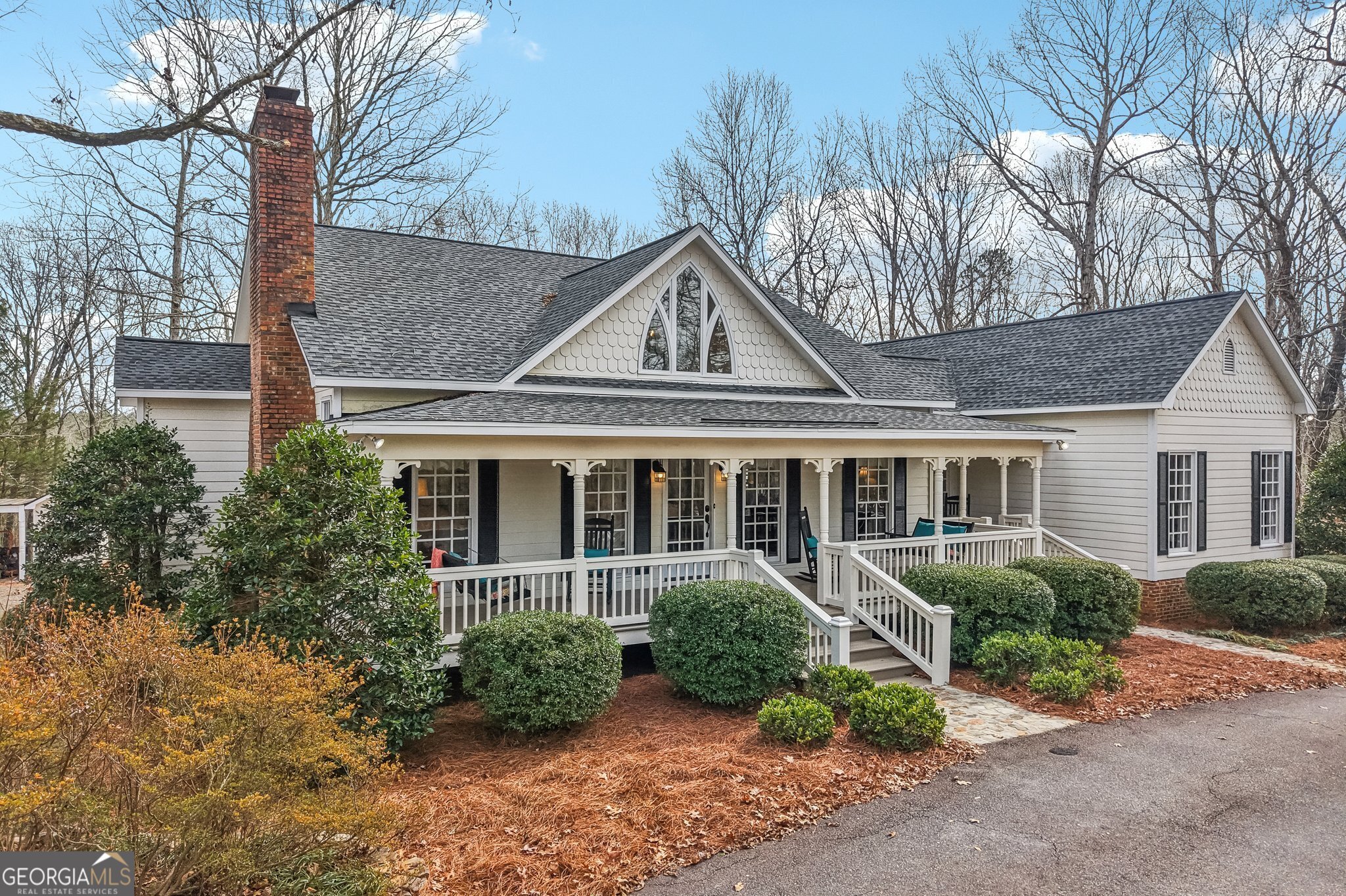 1015 Adams Road West Point, GA 31833 - Photo 2 of 108 a front view of a house with garden